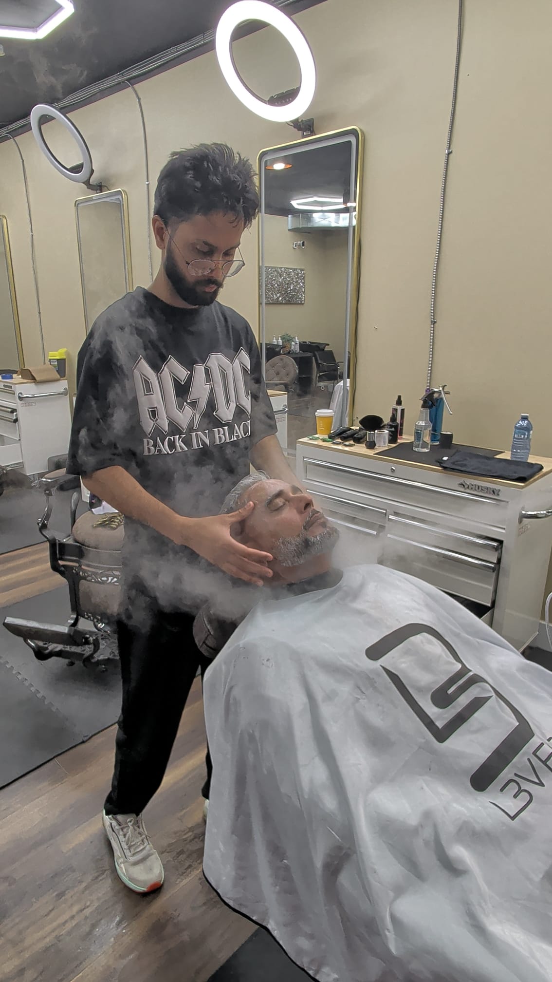 A hot towel steam treatment at Open Chair
